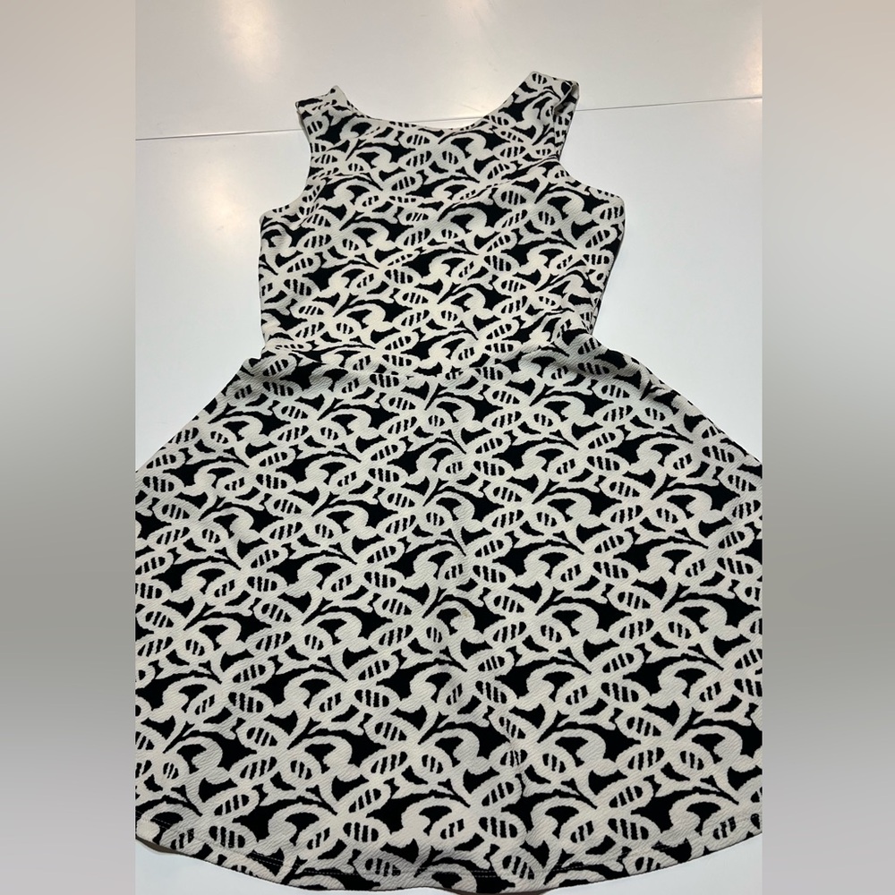 Charming Charlie black and white butterfly high neck dress with bow on back